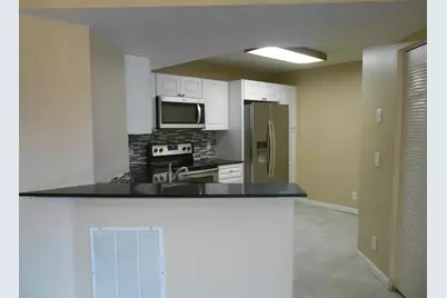 8977 Wiles Road #203, Coral Springs, FL 33067 - Photo 4