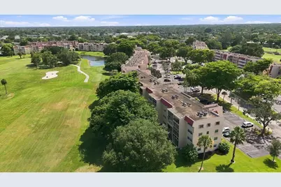 1050 Country Club Drive #306, Margate, FL 33063 - Photo 2