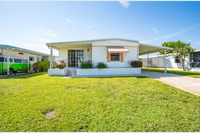 6948 SE Delegate Street, Hobe Sound, FL 33455 - Photo 1