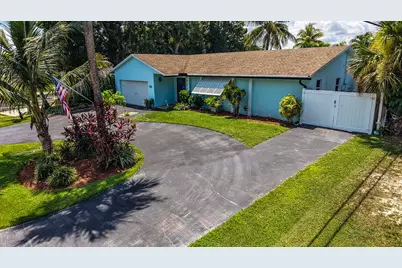 10015 Daisy Avenue, Palm Beach Gardens, FL 33410 - Photo 1
