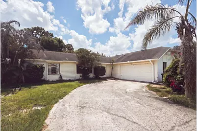 1646 SE Holiday Road, Port Saint Lucie, FL 34952 - Photo 1
