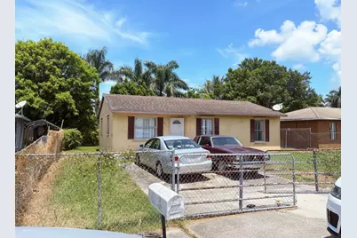 307 Seminole Court, Pahokee, FL 33476 - Photo 1