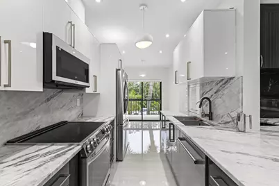11311 Pond View Drive #C203, Wellington, FL 33414 - Photo 1
