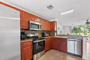 7127 Woodmont Way, Tamarac, FL 33321 - Photo 2