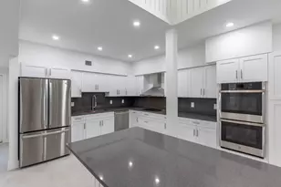 1989 Canterbury Cir, Wellington, FL 33414 - Photo 2