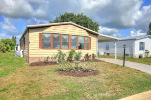 705 Hyacinth Cir, Barefoot Bay, FL 32976 - Photo 2