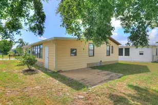 705 Hyacinth Cir, Barefoot Bay, FL 32976 - Photo 4