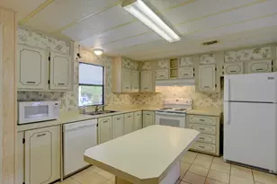 705 Hyacinth Cir, Barefoot Bay, FL 32976 - Photo 10
