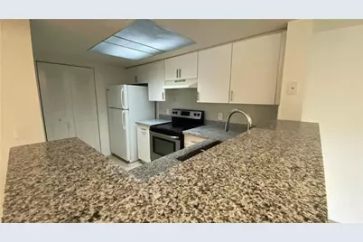 5045 Wiles Road #205, Coconut Creek, FL 33073 - Photo 1