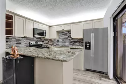 9993 NW 7th Street, Plantation, FL 33324 - Photo 1