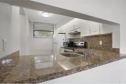 109 Lake Emerald Drive #110, Oakland Park, FL 33309 - Photo 4