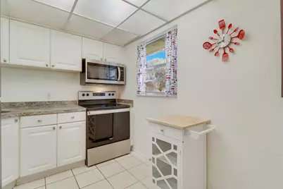 12008 Poinciana Boulevard #108, Royal Palm Beach, FL 33411 - Photo 6