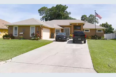 1018 SW Haleyberry Avenue, Port Saint Lucie, FL 34953 - Photo 1