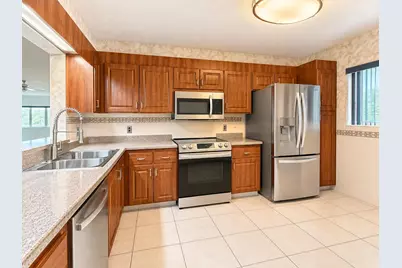3178 Via Poinciana Drive #411, Lake Worth, FL 33467 - Photo 2