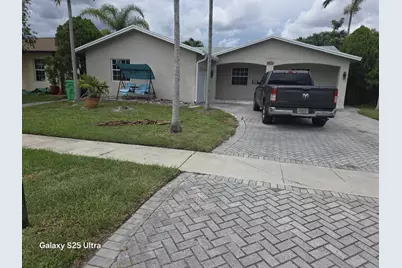 10975 NW 27th Place, Sunrise, FL 33322 - Photo 1