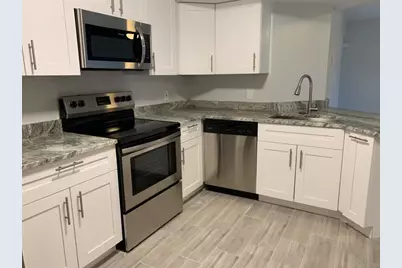 9033 Wiles Road #205, Coral Springs, FL 33067 - Photo 2