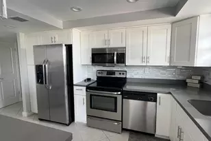137 Golden Isles Dr, Hallandale Beach, FL 33009 - Photo 1