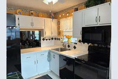 8350 Sands Point Boulevard #E310, Tamarac, FL 33321 - Photo 6