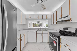 10634 W Clairmont Cir, Tamarac, FL 33321 - Photo 12