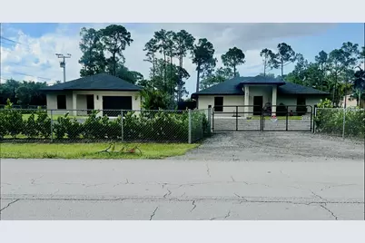 18477 Sycamore Drive W, The Acreage, FL 33470 - Photo 1