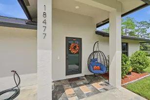 18477 Sycamore Dr W, The Acreage, FL 33470 - Photo 76