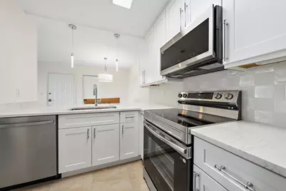 3404 Gardens East Drive #21A, Palm Beach Gardens, FL 33410 - Photo 2