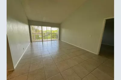 8891 Wiles Road #303, Coral Springs, FL 33067 - Photo 4