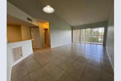 8891 Wiles Road #303, Coral Springs, FL 33067 - Photo 2