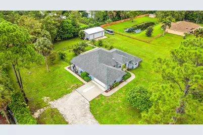 16395 E Hialeah Drive E, The Acreage, FL 33470 - Photo 44