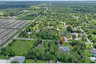 16085 E Secretariat Drive, The Acreage, FL 33470 - Photo 52