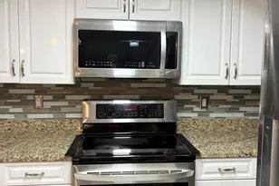 1000 Crestwood Ct S, Royal Palm Beach, FL 33411 - Photo 4