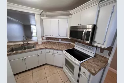 118 Lake Emerald Drive #103, Oakland Park, FL 33309 - Photo 4
