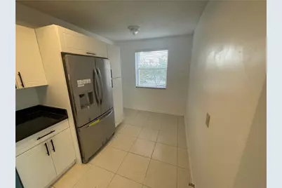9033 Wiles Road #302, Coral Springs, FL 33067 - Photo 6