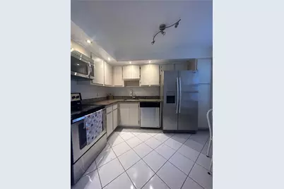 3970 Oaks Clubhouse Drive #310, Pompano Beach, FL 33069 - Photo 4