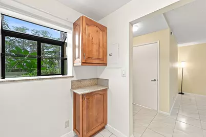 2753 S Oakland Forest Drive #102, Oakland Park, FL 33309 - Photo 14