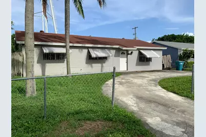 5708 Driftwood Street, Mangonia Park, FL 33407 - Photo 1