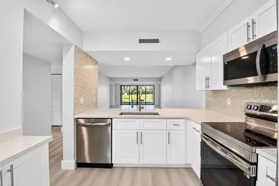 3507 Village Boulevard #105, West Palm Beach, FL 33409 - Photo 12