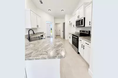 4089 SW McIntyre Street, Port Saint Lucie, FL 34953 - Photo 6