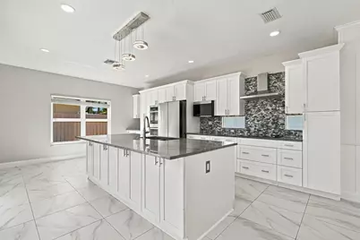 8064 Pelican Harbour Drive, Greenacres, FL 33467 - Photo 12