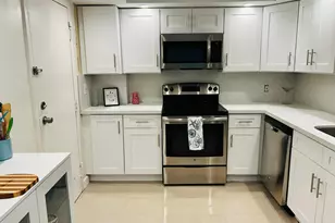 437 Golden Isles Dr, Hallandale Beach, FL 33009 - Photo 4