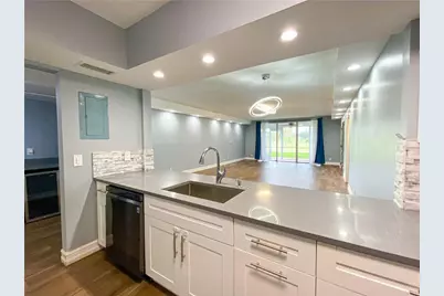 3900 Oaks Clubhouse Drive #106, Pompano Beach, FL 33069 - Photo 24