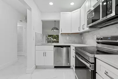 460 Paradise Isle Boulevard #101, Hallandale Beach, FL 33009 - Photo 8