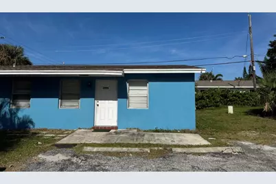 1976 Windsor Drive, North Palm Beach, FL 33408 - Photo 1