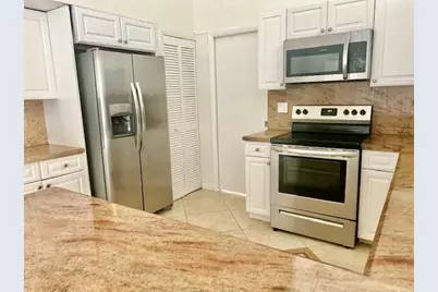 7045 Golf Pointe Circle #7045, Tamarac, FL 33321 - Photo 10
