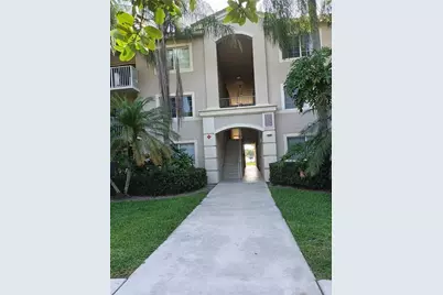 5051 Wiles Road #202, Pompano Beach, FL 33073 - Photo 1