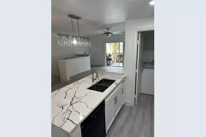 5840 W Sample Road #302, Pompano Beach, FL 33067 - Photo 8