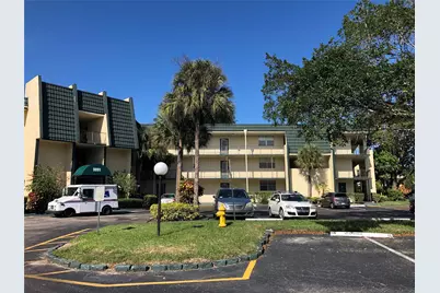 9091 Lime Bay Boulevard #203, Tamarac, FL 33321 - Photo 1