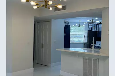 8891 Wiles Road #208, Pompano Beach, FL 33067 - Photo 12