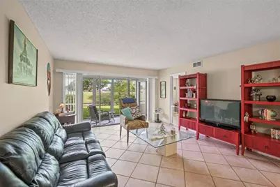 7410 Woodmont Terrace #109, Tamarac, FL 33321 - Photo 2