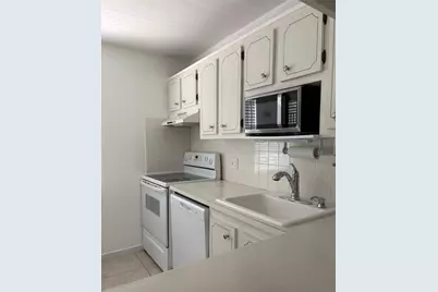 1055 Country Club Drive #404, Margate, FL 33063 - Photo 2